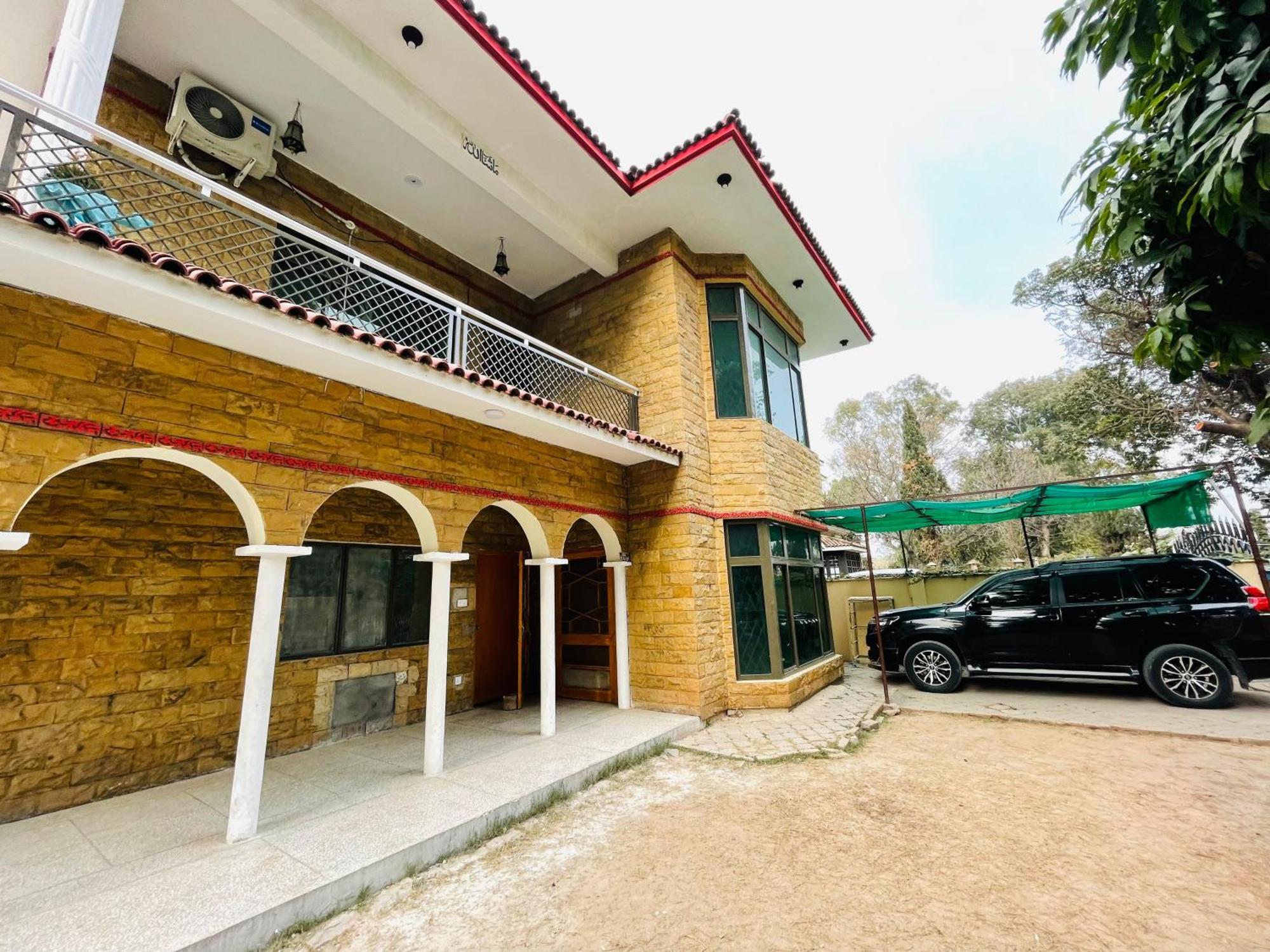 Hilton Guest House Исламабад Экстерьер фото